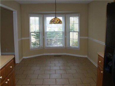 Another view of the kitchen, has bay window.