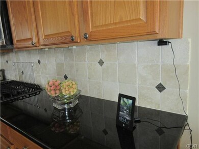 Close up of the back splash and under the counter 