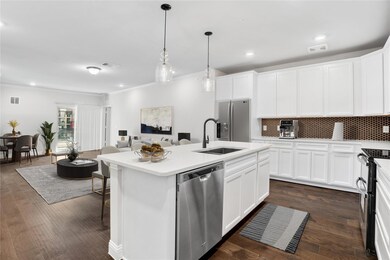 The backsplash and hardware finishes are top of th