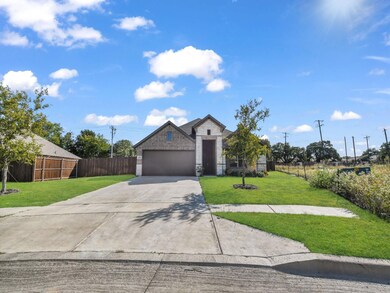 View of front facade featuring a front yard and a 