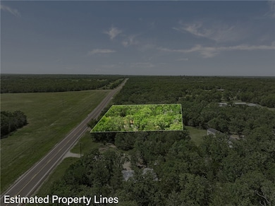 Aerial view of sparsely populated area featuring p