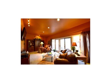 Living room walks out to 2nd fairway of Blue Hills