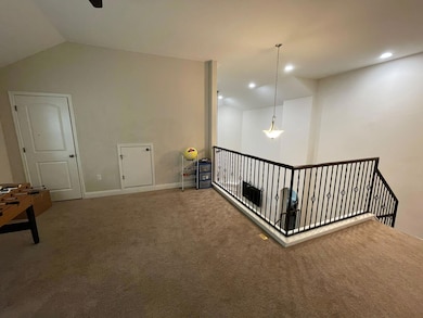 Bonus room with carpet flooring, lofted ceiling, 