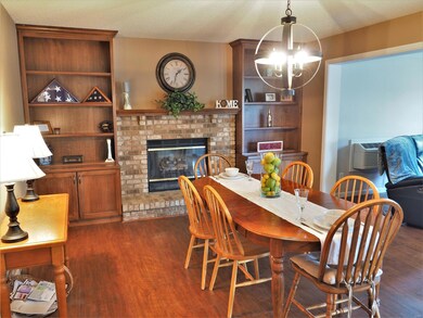 Hearth room has built-in bookcases (2012), updated