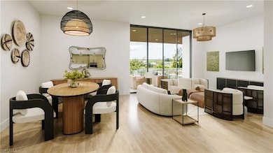 Dining area with light hardwood / wood-style floor