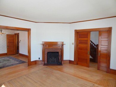 Living room featuring the fireplace...