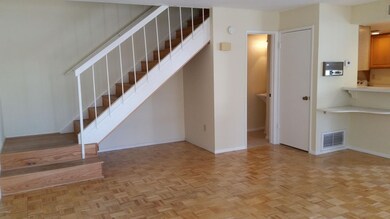 STAIRWAY AND HALF BATH DOWNSTAIRS
