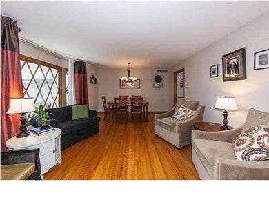 Lving Room with hardwood floors & bay window