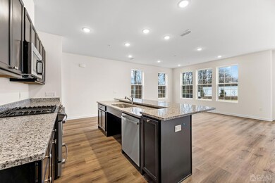 Lots of daylight on the main level; tons of cabinets and pantry in the kitchen