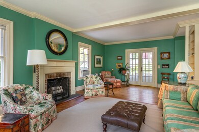 French doors lead to a stone patio.