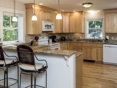 The kitchen with birch cabinets...
