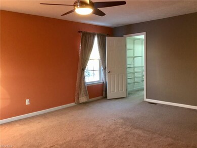 Master suite with walk-in closet and bath