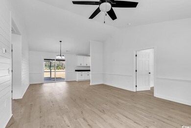 Unfurnished living room with light wood-type floor