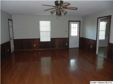 LARGE DEN WITH HARDWOOD FLOORS