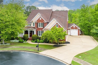 Craftsman inspired home featuring a garage, drivew