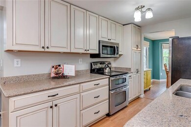 Spacious pantry, drawer organizers, and double ove