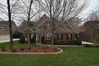 Well manicured lawn and landscaping give this home