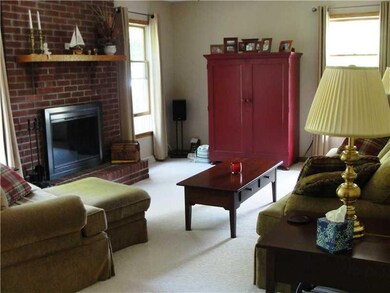 Family Room. Family Room w/ Brick Wood-Burning Fir