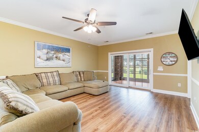 Living room featuring light wood-type flooring, or