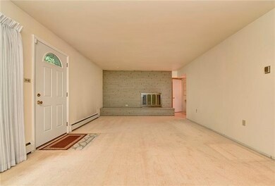 An expansive living room with fireplace