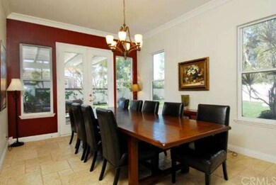 Dining room w/French doors & view of backyard