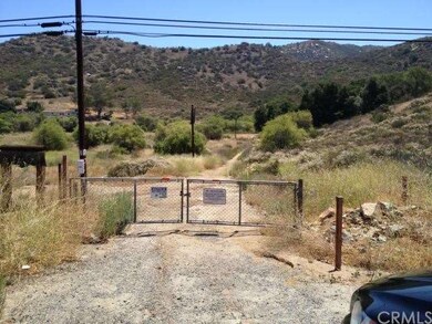 Gate at Champagne road to access lot. Best way to 
