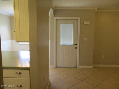 Entry into unit. Kitchen to the right and family r