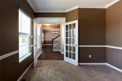 Graced with hardwood floors and 9' ceilings, the f