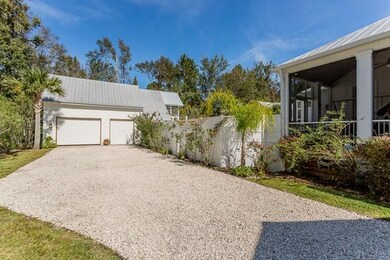 Oversized 2.5 car garage w/ guest house above