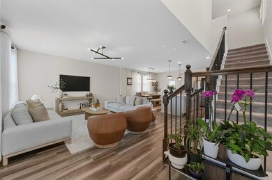 Living room with wood-type flooring