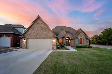 View of front of property with driveway, a yard, r