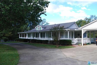 Spacious carport allows you to park and walk into 