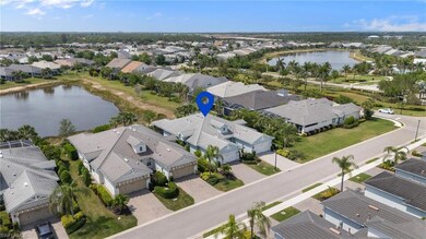 Drone / aerial view with a water view and a reside