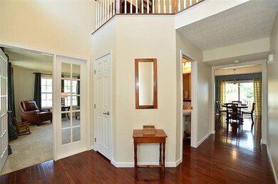 Enter the 2 story Grand Foyer on real oak hardwood