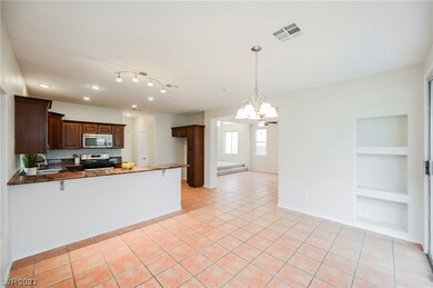 Formal dining space just off the beautiful kitchen