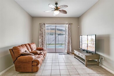 FAMILY ROOM has SLIDING DOORS lead you to the SCRE