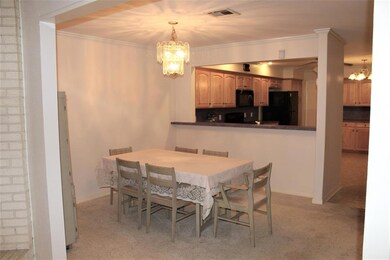 DINING: Roomy dining area. There is a breakfast ba