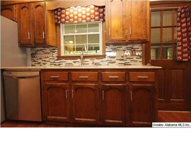 Newly updated kitchen features beautiful backsplas