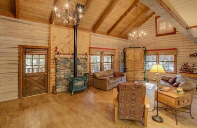 Greatroom - Wood floor & gas log stove