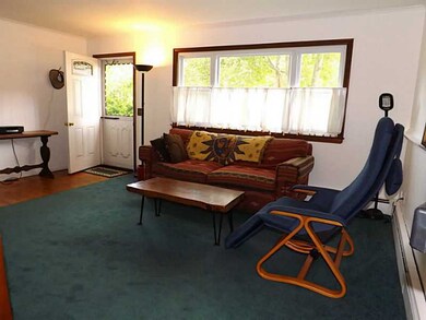 Living Room. Large window in living room makes it