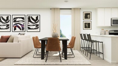 Dining room featuring a healthy amount of sunlight