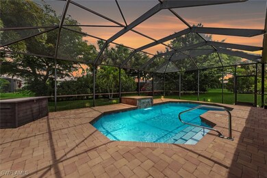 Swimming pool featuring a patio and a lanai