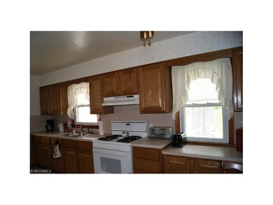 Plenty of storage in this updated oak kitchen