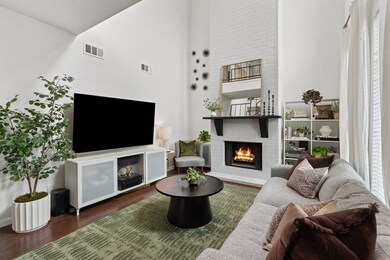 This inviting living room features a high ceiling