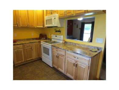 Kitchen. New cabinets, countertop and flooring.