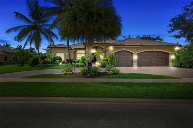 Three car garage and circular paved driveway