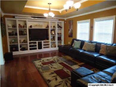 Living Room with Bamboo floors and built in entertainment center