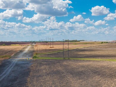 View of yard with a rural view