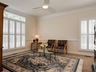 Front room or living room with plantation shutters