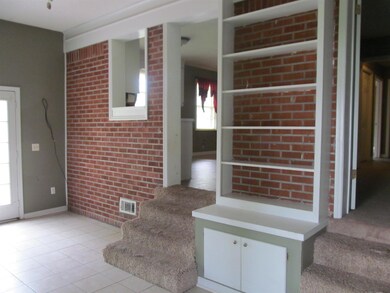 The brick walls add lots of character to this room.